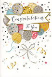 In this image, a tall congratulations card stands like a little window into a celebration, its artwork capturing the airy joy of balloons rising over a happy gathering in Whetstone. A rounded bouquet of illustrated balloons dominates the scene, stacked in soft layers of gold, silver, champagne, pale blue, blush pink and gentle grey. Each balloon is uniquely decorated-some with tiny scattered stars, others with bold metallic stripes or delicate glittering patterns-so the cluster feels as varied and harmonious as a well-balanced floral arrangement. Slim, shimmering strings trail downwards in loose curls of gold and silver, meeting near the bottom of the design in a stylish flourish that hints at movement, like ribbons catching a breeze along a quiet side street off Whetstone High Road. Surrounding the balloons, sparkling star shapes and whimsical ribbon swirls drift across a soft, light background, evoking confetti tossed skyward at the exact moment good news is announced. Across the middle, a graceful banner stretches from side to side, gently curved and inscribed with the words "Congratulations To You" in refined, flowing calligraphy that radiates warmth and sincerity. The overall atmosphere is bright yet elegant, festive without feeling loud-a perfect partner to a hand-tied bouquet delivered to mark exam results, a promotion, or any milestone that deserves to be remembered. Looking at this card through a florist's eyes, it has the same layered textures, balanced colours and sense of thoughtful celebration we strive for when arranging fresh blooms for local Whetstone celebrations.